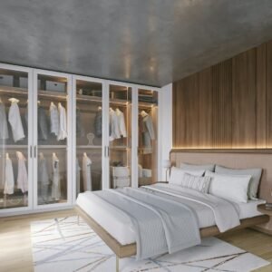 Aurum three door wooden wardrobe beside a bed